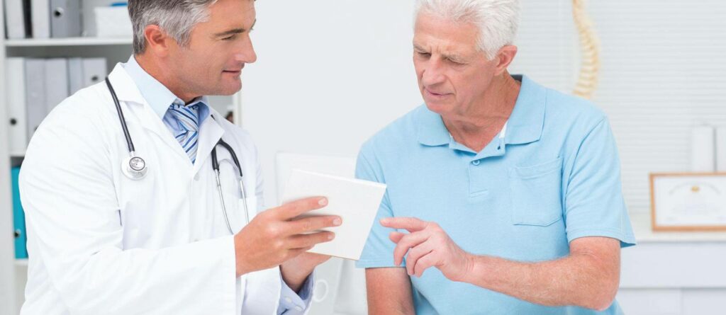 Doctor and patient conversing