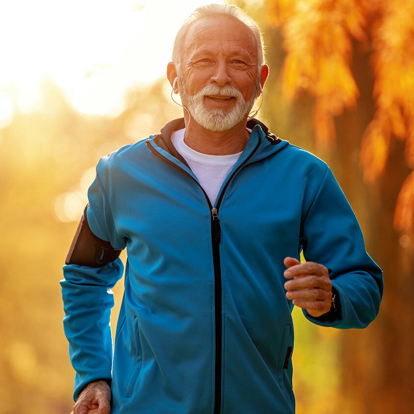 Senior man running in the park